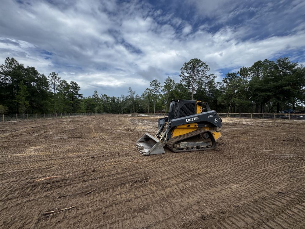 Bradberry Land Management Deere track loader on a freshly cleared lot